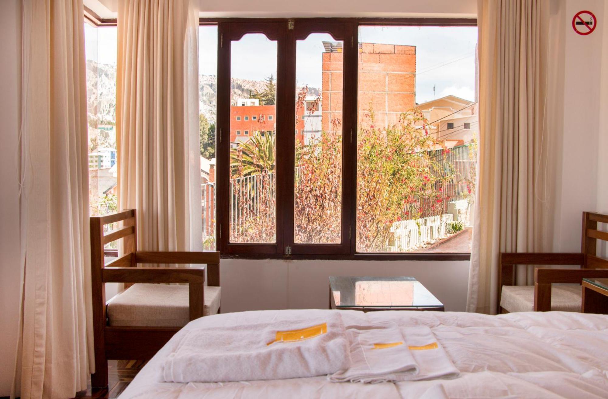 Qhini Hotel Boutique Ла Пас Стая снимка